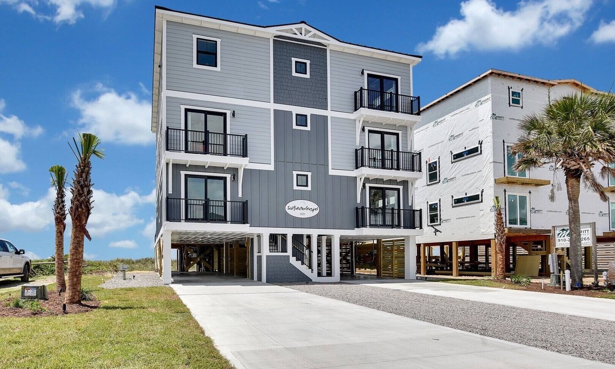 Yaupon Beach House | Experience luxury at Saltwater Gospel, a stunning 13-bedroom oceanfront retreat in Oak Island!