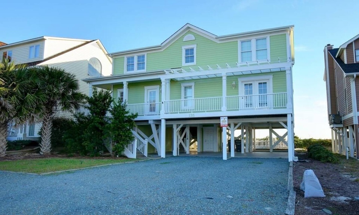 Holden Beach House | Experience oceanfront luxury at Sweet Dreams, a spacious 4BR retreat in Holden Beach.
