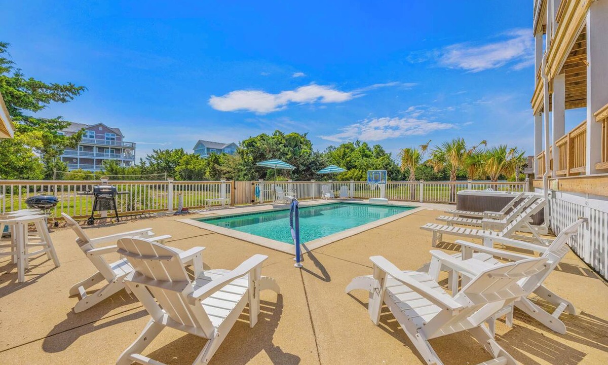 Wind Over Waves House | SemiSoundfront Dog Friendly w/Pool, Elevator, Hot Tub, Tiki Bar, Cmty Boat Ramp