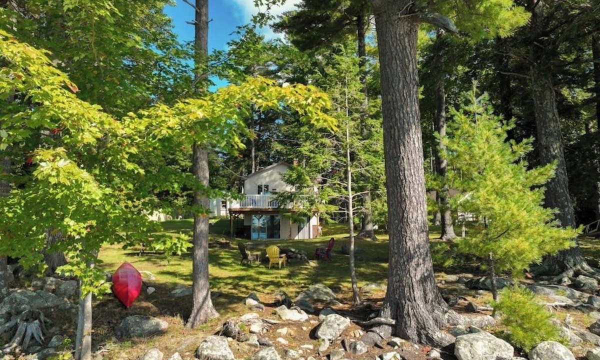 South China House | Two-story lakefront home with a seasonal dock, furnished deck, & washer/dryer