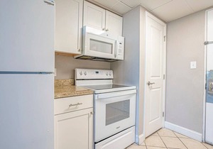 Great 1st floor unit that looks right out onto the beach with direct access