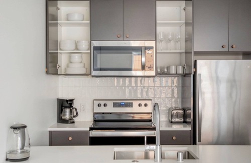 Judkins Park Apartment | Airy Central District 1BR w/Gym & Pets, nr Dining, by Blueground