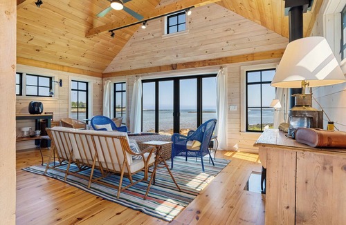 Prospect Harbor House | Aril Cottage - Cozy oceanfront cottage for 2 near Acadia, with WiFi, firepit, & wood stove