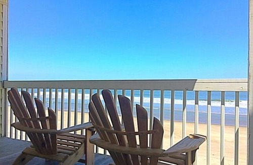 Kure Beach Apartment | Beach Blanket - Spacious condo with Private beach access and resort amenities! condo