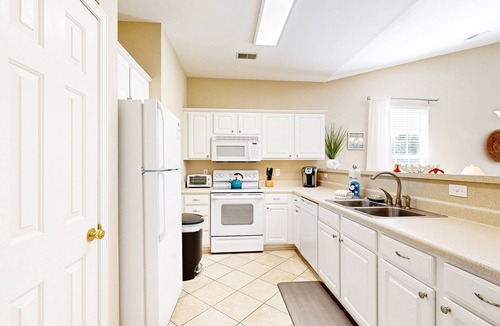 Sunset Beach Condo | Chasing Sunsets: Waterfront condo with pool, tennis, bikes & lagoon/golf views - near the beach