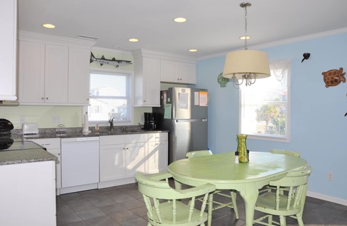 Holden Beach House | Coastal bungalow charm with dock, porch views, and easy beach access in a renovated retreat