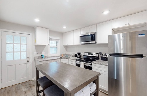 Kure Beach Cottage | Coastal cottage with short walk to the beach and fishing pier