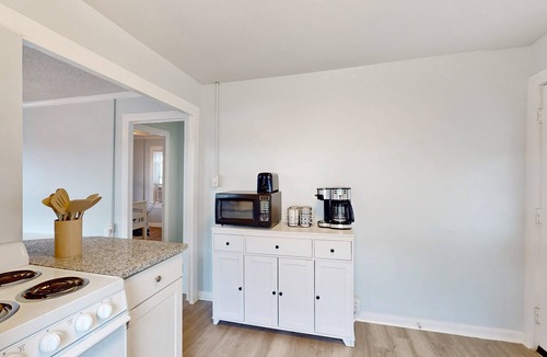 Kure Beach Cottage | Coastal cottage with short walk to the beach and fishing pier