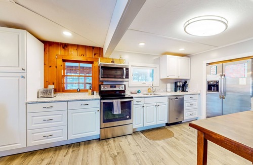 Castleton House | Dog-friendly lakefront oasis with scenic patio & firepit - near skiing & golf