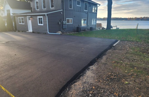 Delton House | Enjoy a freshly remodeled cottage with a large beach and plenty of parking.