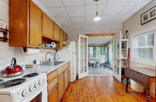 Augusta Cabin | Entire lakefront home on Togus Pond with decks, canoe, firepit & great view