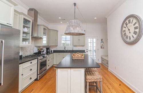 Holden Beach House | Experience oceanfront luxury at Sur La Mer, a 5-bedroom dog-friendly retreat with a private pool.