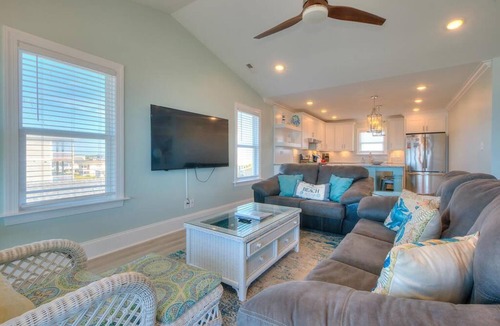 Long Beach House | Experience oceanfront bliss at Blue Yonder, a spacious 4-bedroom retreat in Oak Island.