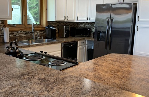 Otis House | Family friendly, pet friendly lakeside retreat. Close to Acadia National Park.