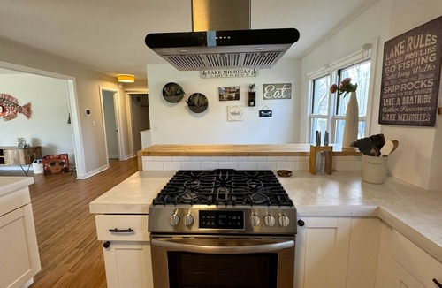 Shorewood-Tower Hills-Harbert House | Heated pool hot tub play set screened porch sauna putting green