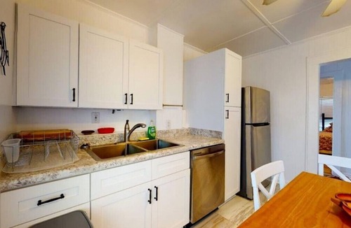 Kure Beach Cottage | Kure Cottage-Feel the uniqueness of this classic oceanfront Beach Cottage Vacation Rental in Kure Beach.