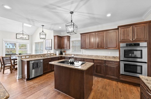 Mooresville House | Lake Escape| Lakefront 7BR retreat with pool, dock, game room, and kayaks.
