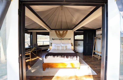 Cedar Bluff Resort | Lake Front Exclusive Glamping Tent: Hot Tub, TV, & Soaking Tub