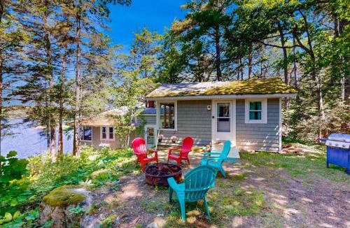 Bremen House | Lakefront cottage with dock, screened porch, & Island in Biscay Pond