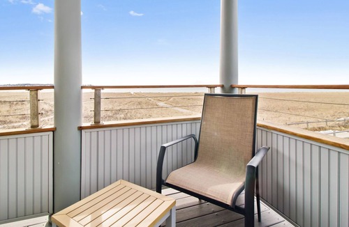 Pine Point Condo | Lighthouse Suites are located directly on the white sands of Pine Point Beach.