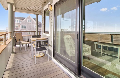 Pine Point Condo | Lighthouse Suites are located directly on the white sands of Pine Point Beach.