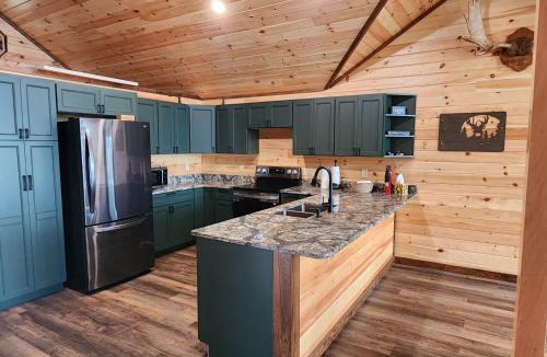 North Penobscot House | Luxurious and very private lake front cottage