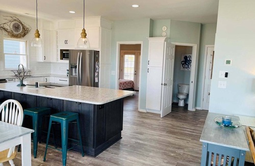Holden Beach House | Oceanfront bliss awaits at Our Sand Dune, a spacious 5-bedroom retreat in Holden Beach.