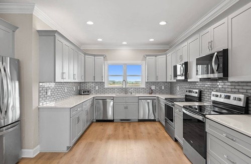 Oak Island House | Oceanfront West Point in Oak Island: 12 bedrooms, sleeps 30, with luxury amenities.