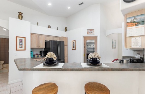 Orange Tree House | Orange Tree Pool Home with spa. Enjoy recreation and relaxation in this inviting community near the best of Orlando's hot spots!