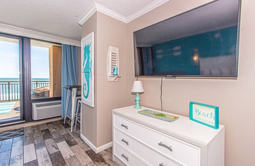 Myrtle Beach Apartment | Over-sized Luxury Balcony with teak loungers! Modern Style in the Golden Mile