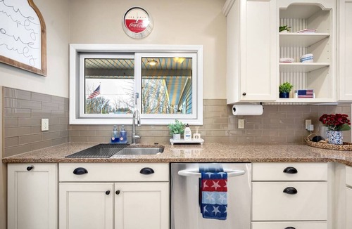 Paw Paw Lake House | Private lagoon retreat with walkable Paw Paw Lake access. Offers a peaceful setting with water views, fishing, and outdoor space to relax. Close to wineries, Lake Michigan beaches, and local attractions—perfect for family and group getaways.