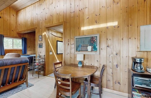 Ellsworth Cabin | Quiet lakefront cottage with a firepit, private beach, & two kayaks
