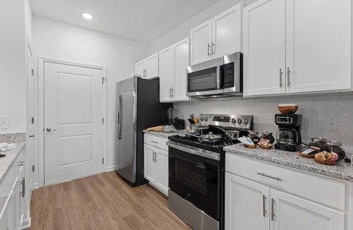 Northside House | Resort Style Luxury Townhome with Garage POOL, 1st Floor Bedroom, Gym!