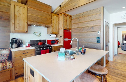 Sun Valley House | Riverside cabin with mountain views, fireplace, covered patio, firepit, & W/D