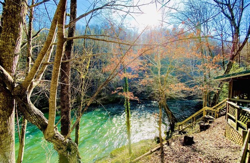 Sevierville Cabin | Secluded Riverfront Cabin Sounds of the River Screened Porch Gazebo Hot Tub