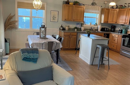 Colington Harbour House | "Semi-soundfront beach cottage with beautiful water views and pool access!