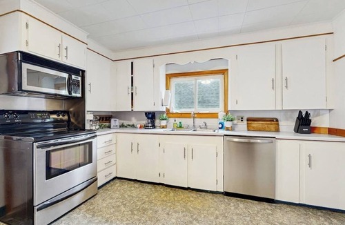 Winterport House | Serene Waterfront Home with In-Ground Pool, River Views, Spacious Deck, & Grill