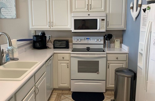 Sunset Beach Condo | Sunset Beach Condo No Cleaning Fee Peaceful Pond & Fountain View