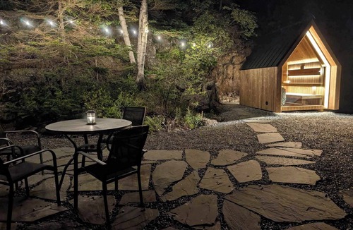 Bernard Cabin | Sunset Oceanfront Cabin with Beach, Dock and Sauna