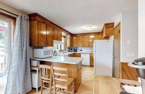 South China House | Two-story lakefront home with a seasonal dock, furnished deck, & washer/dryer