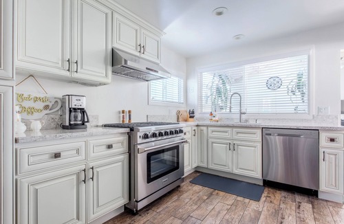 Peninsula House | Walk to Both the Beach & Bay-Peninsula Home with Two-Car Garage