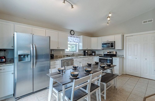 Colington Harbour House | Water views and a fenced-in yard at Meehan Cottage in Colington Harbour