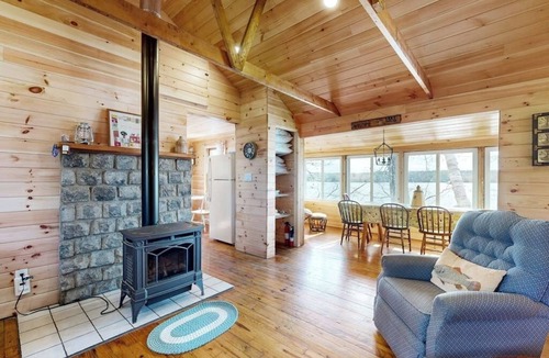 South China Cabin | Waterfront, dog-friendly cabin on China Lake with dock, canoe & firepit