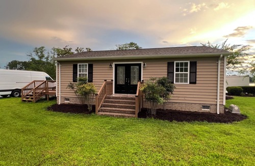 Achilles House | Waterfront Home with stunning views & Hot tub- rent Golf Cart/Kayak/Boat