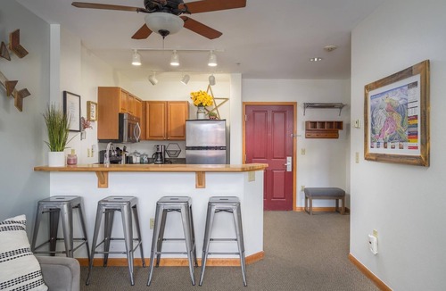 Winter Park Condo | Zephyr Mountain Lodge 2410 | Hot Tubs, Ski In Ski Out, Ski Locker and More! | Steps to Snow