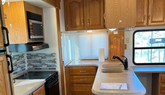 32-FT 5th Wheel Camper/Placitas with great location, views, and privacy.