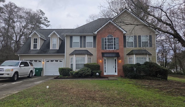 Brilliant 4-bedroom house within minutes from downtown Atlanta and the airport.