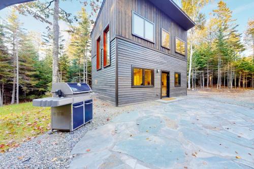 Contemporary retreat with grill, firepit, & patio - walk to beach