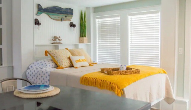 Cozy waterfront retreat with lighthouse view.