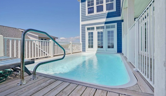 Discover oceanfront bliss at 7th Heaven in Oak Island, NC—spacious 7BR, sleeps 24!